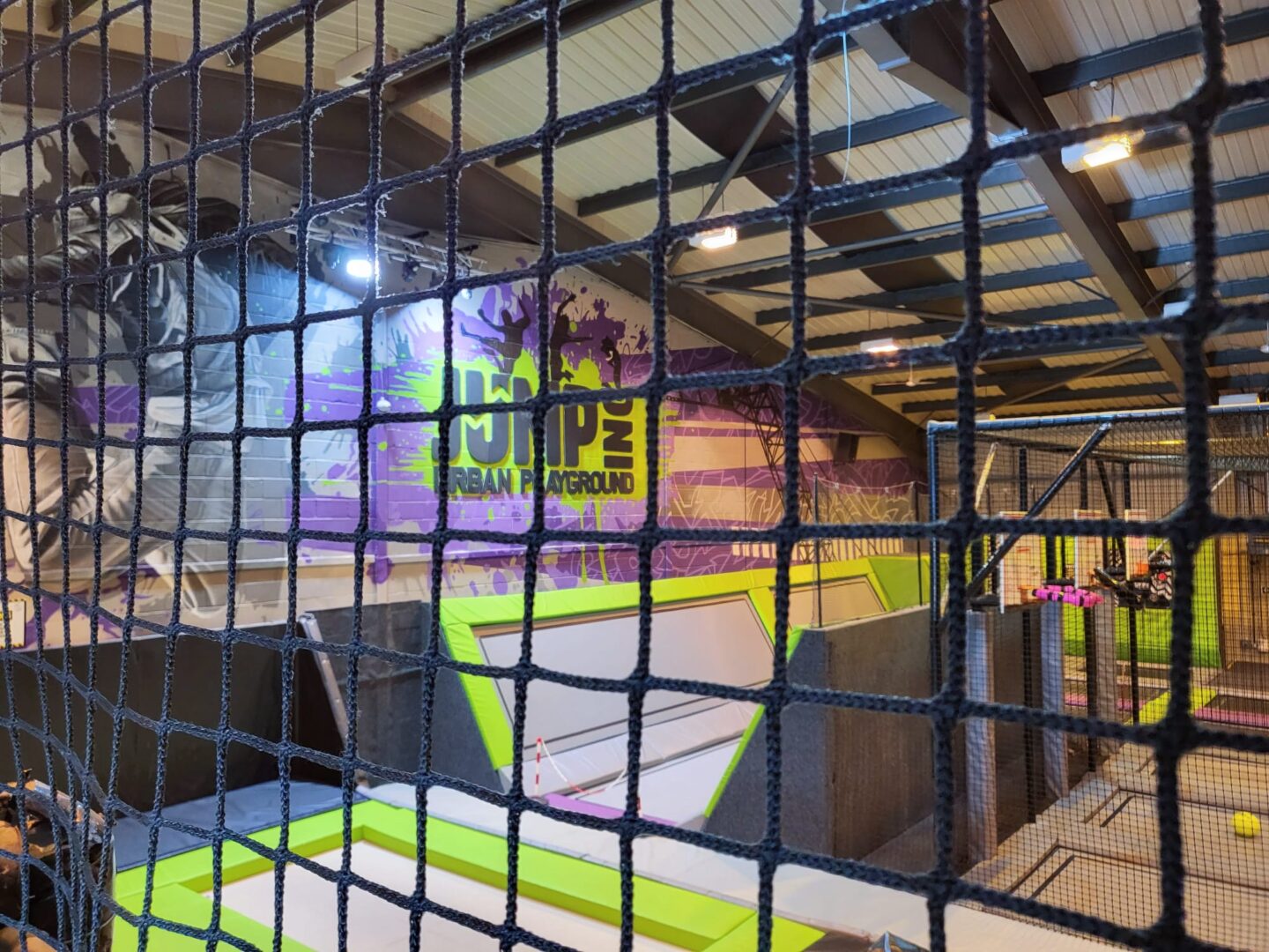Burning energy by trampolining with a toddler at Jump Inc Bicester - trampoline and inflateable park